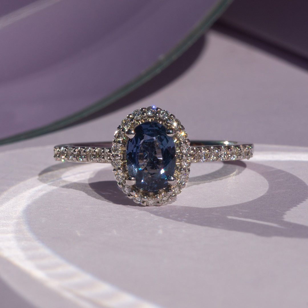 9ct White Gold Ladies Oval Blue Sapphire and Diamond Halo Ring