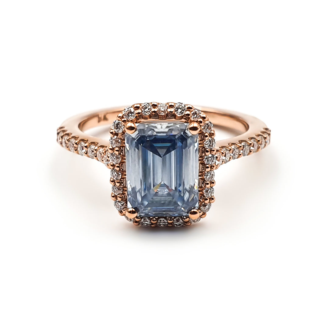 9ct Rose Gold Ladies Blue Moissanite Halo Emerald cut